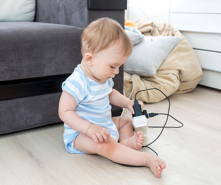 Baby playing with electrical outlet - Baby proofing