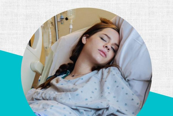 Text: Navigating Inductions: The Power of Childbirth Education. Image of a pregnant women in a hospital bed wearing a blue hospital gown with a restful look on her face.
